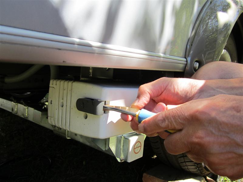 Extraction du cache boulon